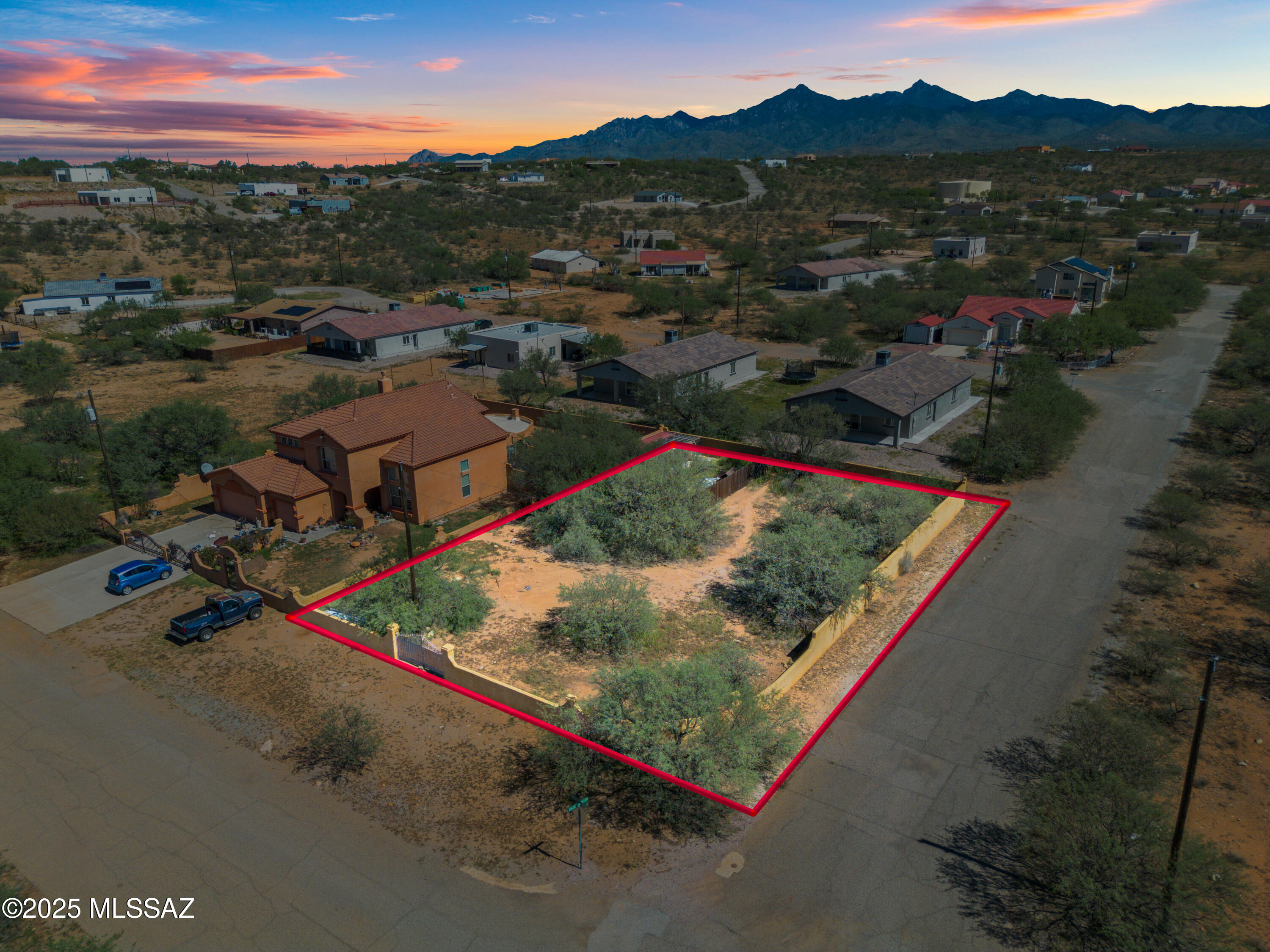 1910 Circulo Mexicali, Unit 173 Rio Rico, AZ 85648 - Photo 1 of 8 an aerial view of a house and an outdoor space