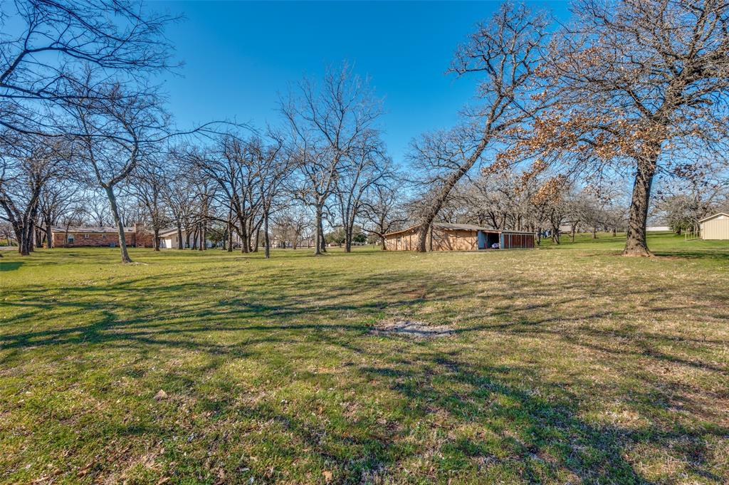 1251 Johnson Road Keller, TX 76248 - Photo 9 of 11 View of yard with an outbuilding and a barn