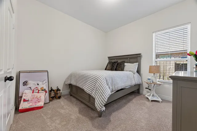 a view of a house with backyard and porch