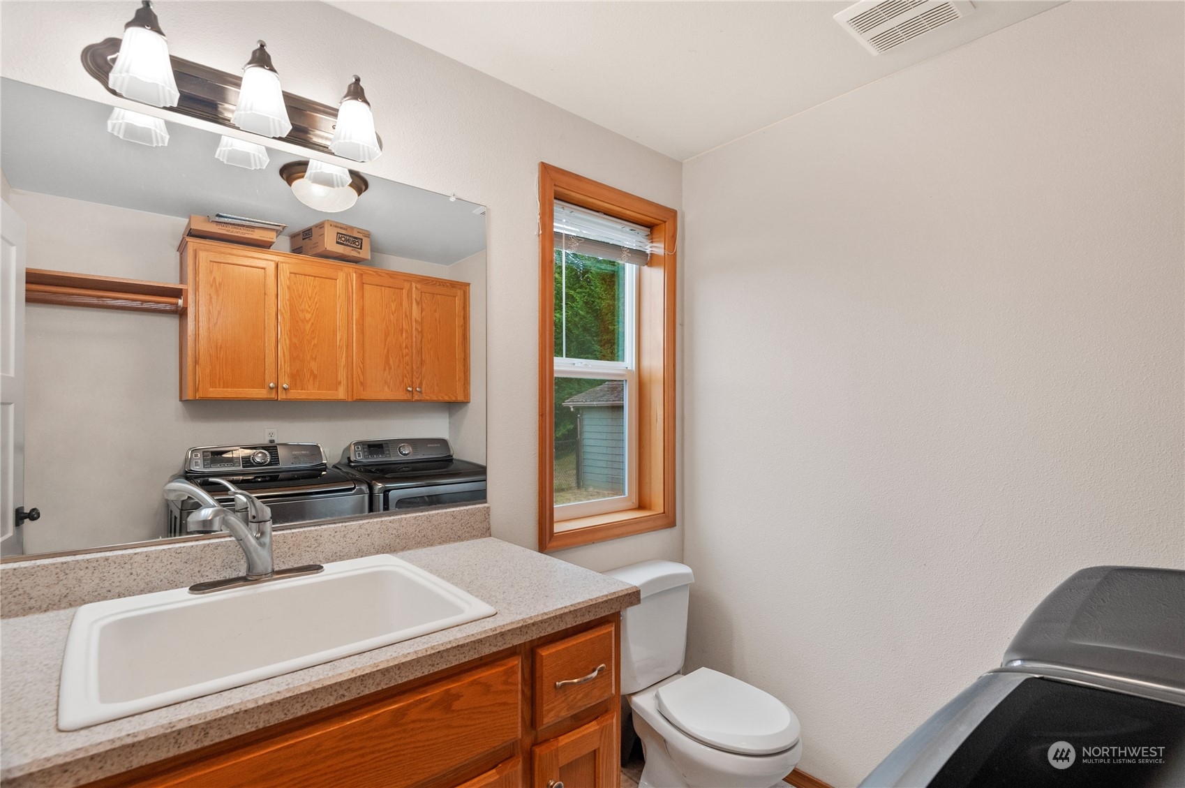 280 Niemi Road Longview, WA 98632 - Photo 11 of 24 a bathroom with a sink toilet vanity and mirror