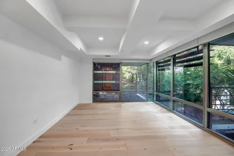 a view of an empty room with a window