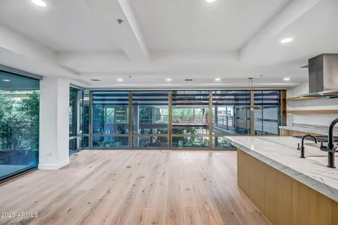a view of wooden floor and a living room