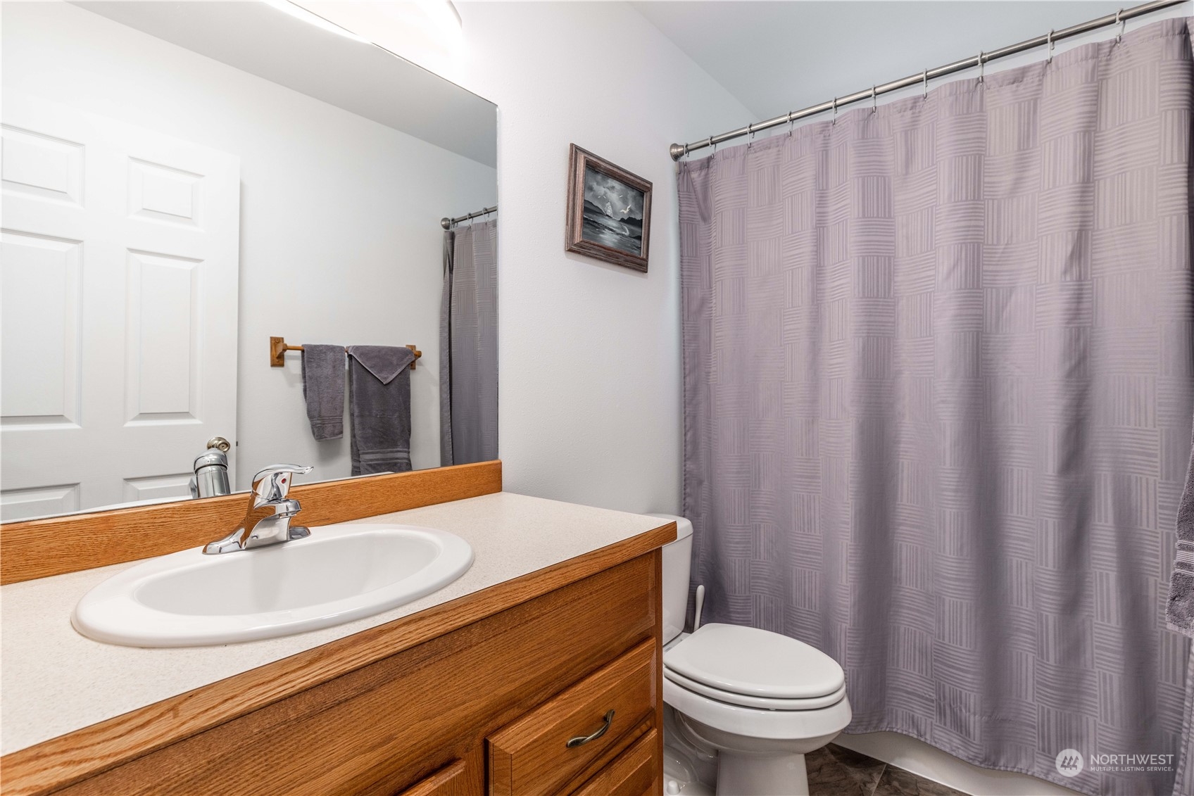 80 East Dunvegan Road Shelton, WA 98584 - Photo 13 of 24 a bathroom with a sink a toilet and a mirror