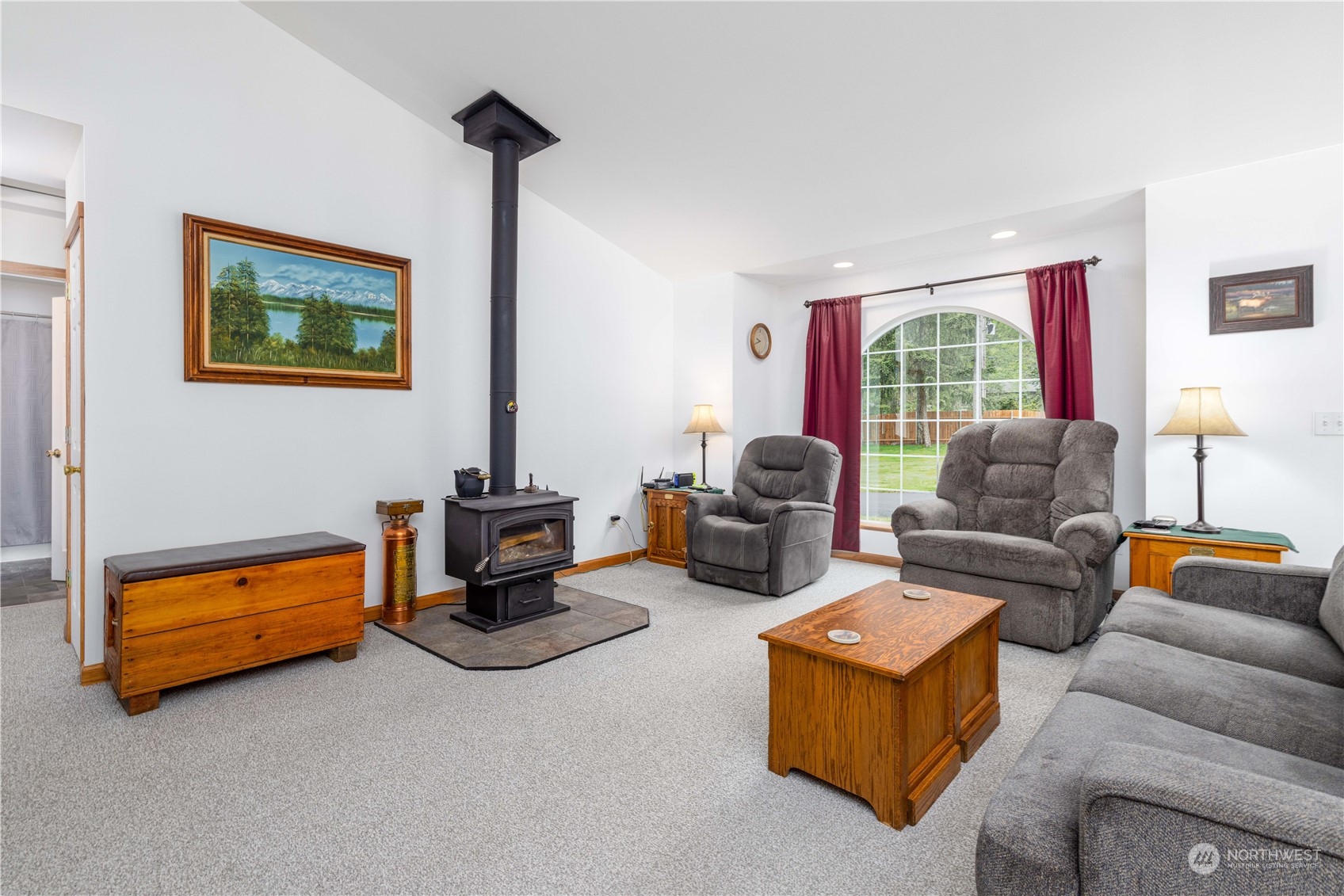 80 East Dunvegan Road Shelton, WA 98584 - Photo 2 of 24 a living room with furniture and a flat screen tv