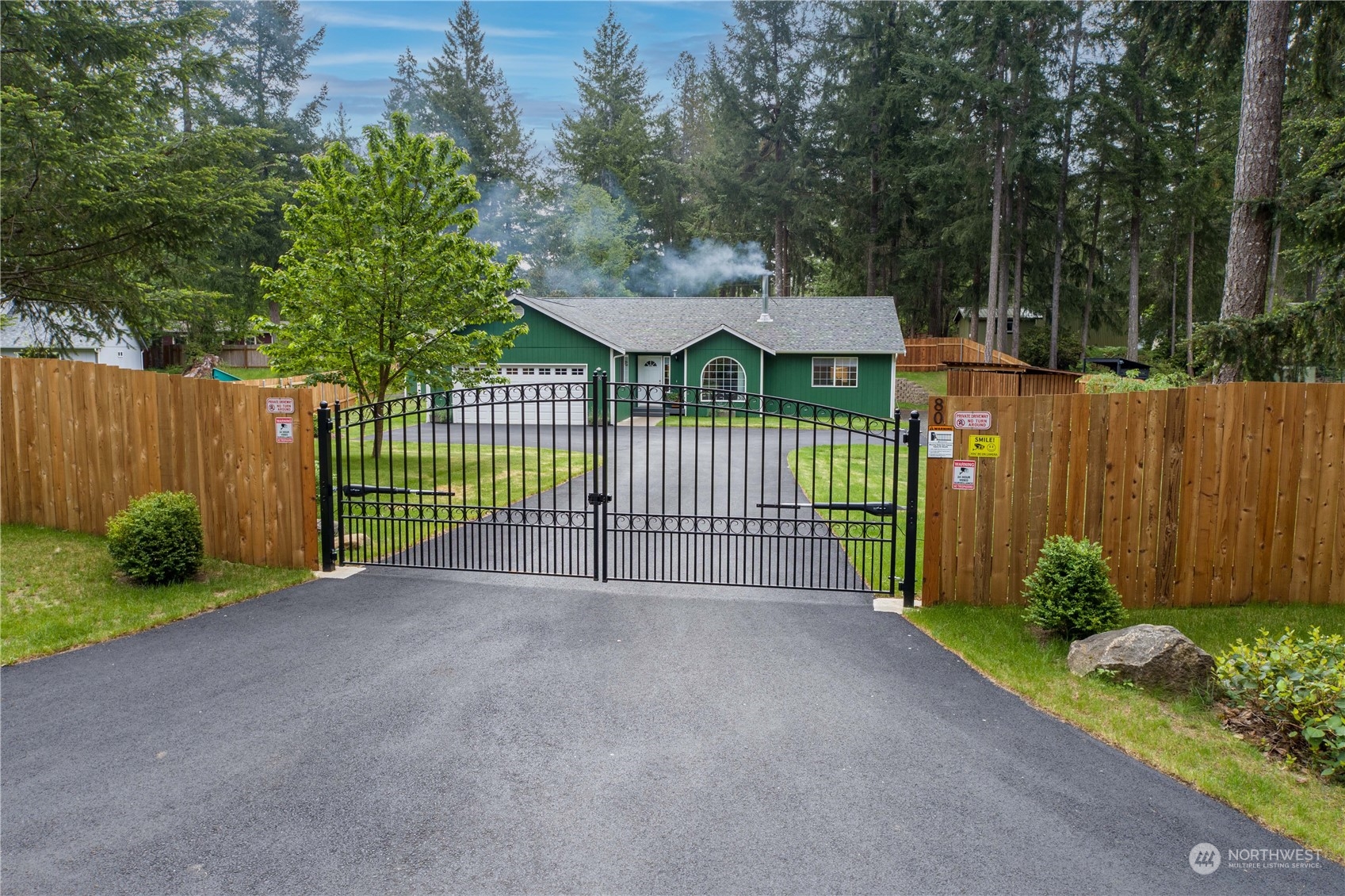 80 East Dunvegan Road Shelton, WA 98584 - Photo 23 of 24 a view of a fence and a garden