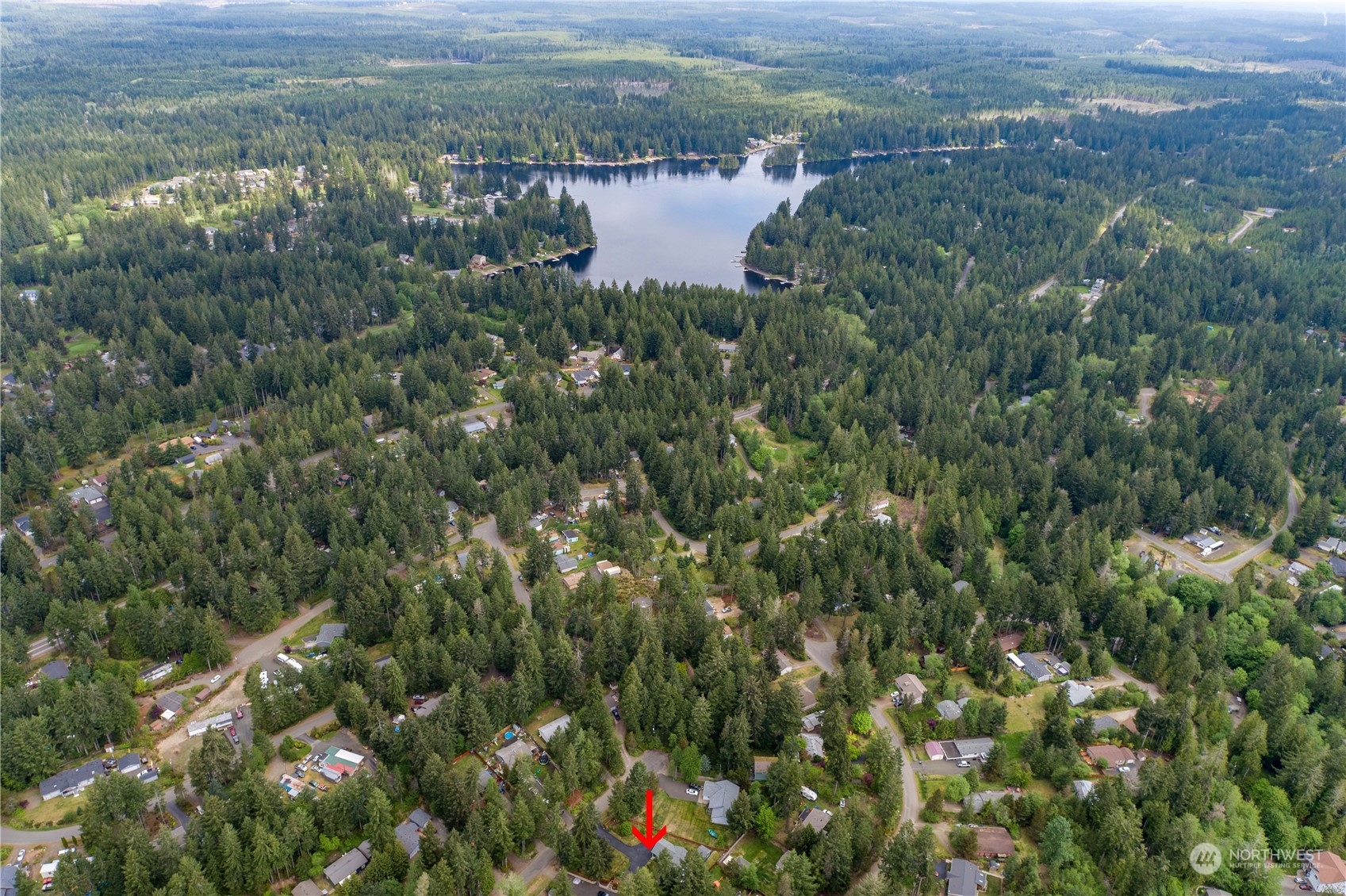 80 East Dunvegan Road Shelton, WA 98584 - Photo 24 of 24 a view of a lake with a lush green forest