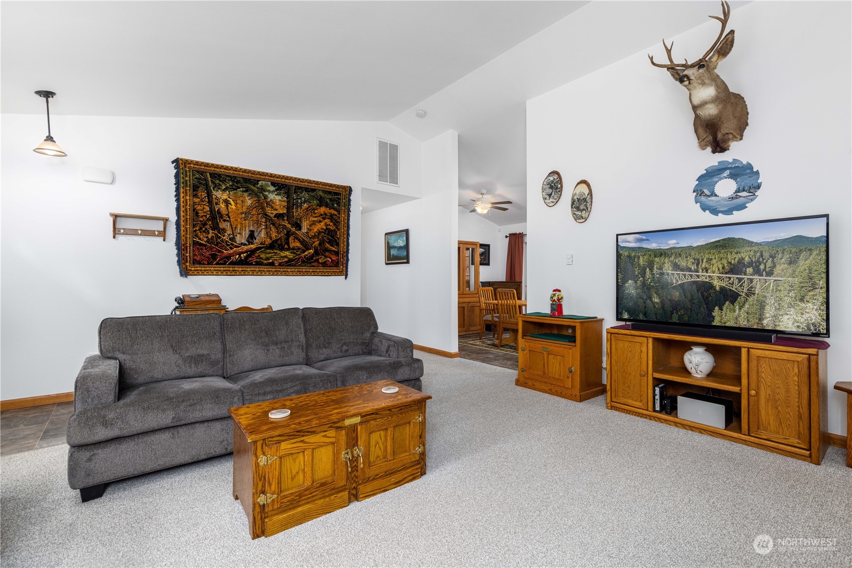 80 East Dunvegan Road Shelton, WA 98584 - Photo 4 of 24 a living room with furniture and a flat screen tv