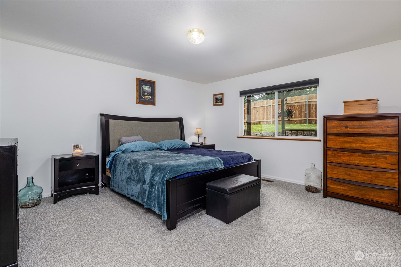 80 East Dunvegan Road Shelton, WA 98584 - Photo 7 of 24 a bedroom with a bed and a dresser