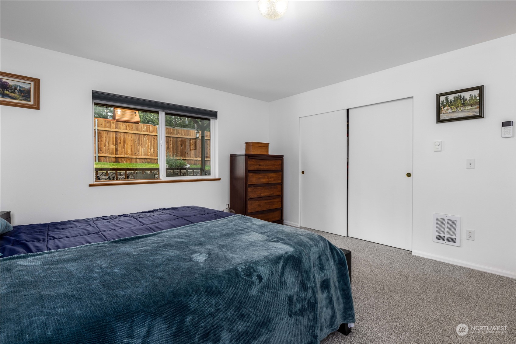 80 East Dunvegan Road Shelton, WA 98584 - Photo 8 of 24 a bedroom with a bed and a window