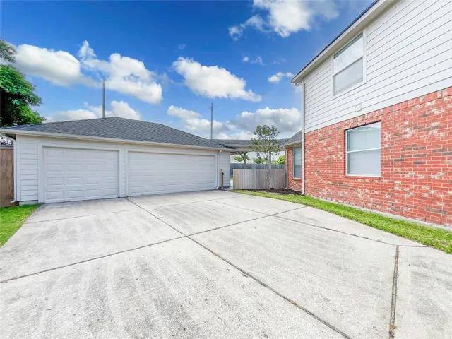 a view of a house with a big yard