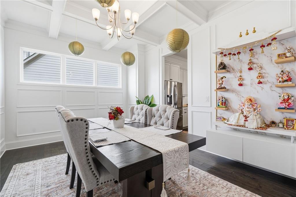178 Fieldbrook Crossing Canton, GA 30115 - Photo 14 of 71 a view of a dining room with furniture and chandelier