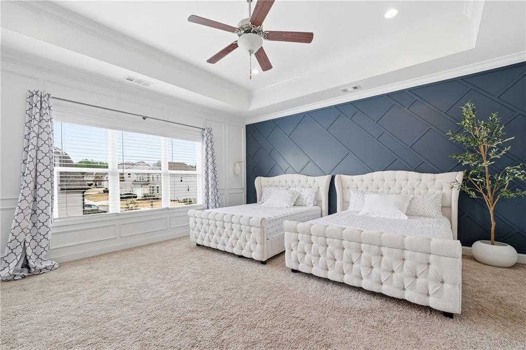 178 Fieldbrook Crossing Canton, GA 30115 - Photo 27 of 71 a large bedroom with a large bed and a large window