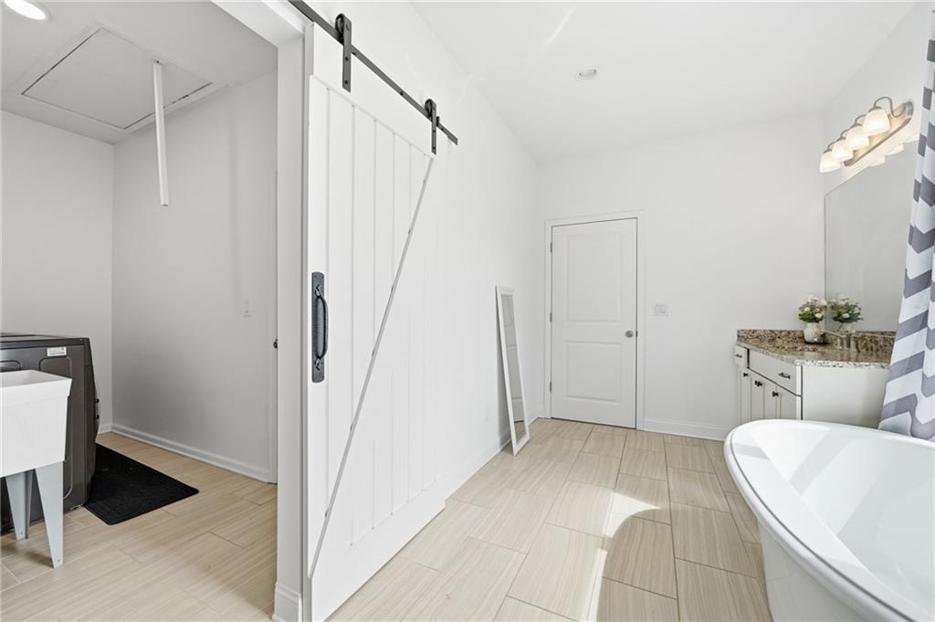 178 Fieldbrook Crossing Canton, GA 30115 - Photo 36 of 71 a bathroom with a sink a toilet and shower