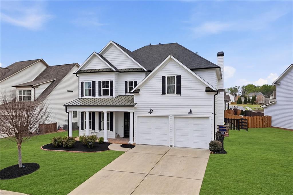 178 Fieldbrook Crossing Canton, GA 30115 - Photo 4 of 71 a front view of a house with a yard