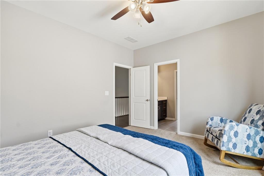 178 Fieldbrook Crossing Canton, GA 30115 - Photo 43 of 71 a bedroom with a bed and a dresser