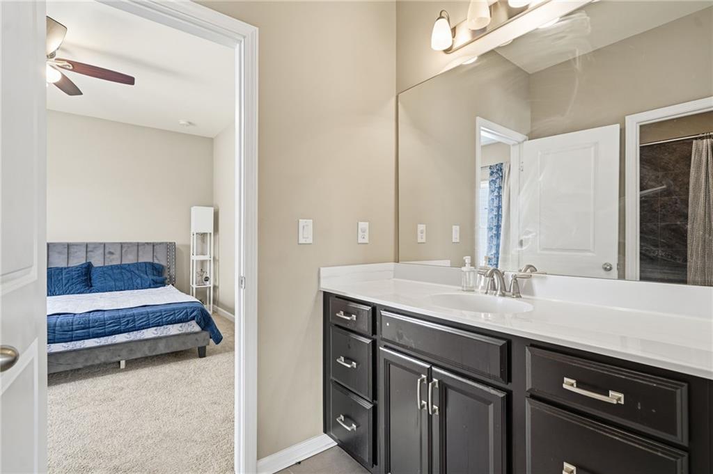 178 Fieldbrook Crossing Canton, GA 30115 - Photo 44 of 71 a en suite bathroom with a sink and a mirror