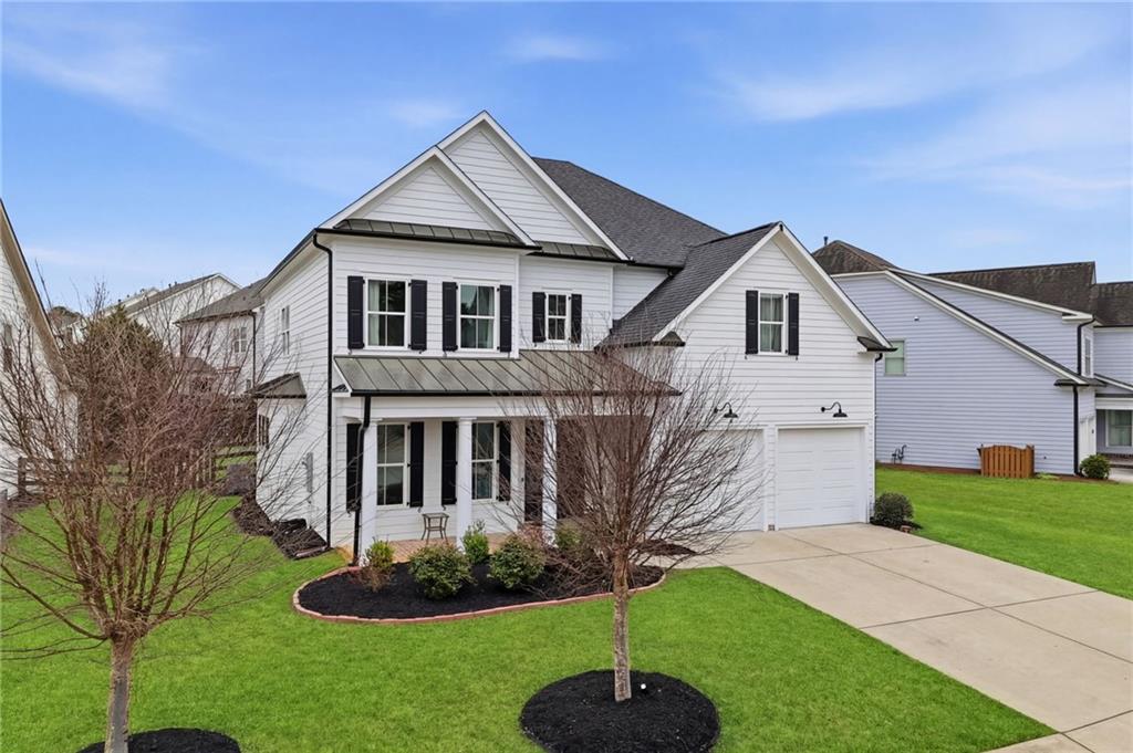 178 Fieldbrook Crossing Canton, GA 30115 - Photo 5 of 71 a front view of a house with a yard and trees