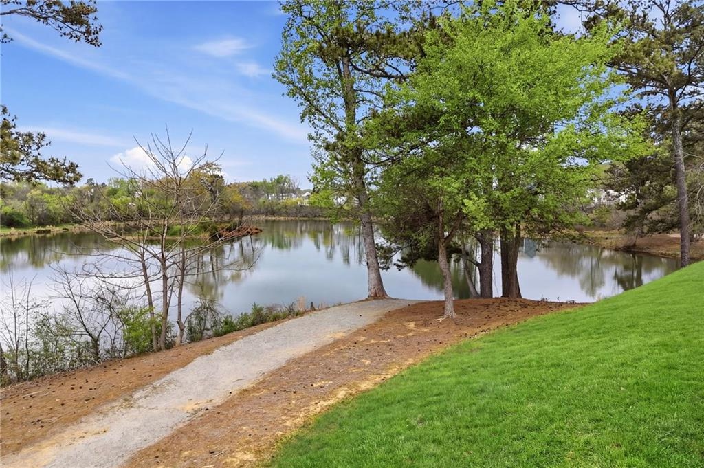 178 Fieldbrook Crossing Canton, GA 30115 - Photo 64 of 71 a view of a lake with a garden
