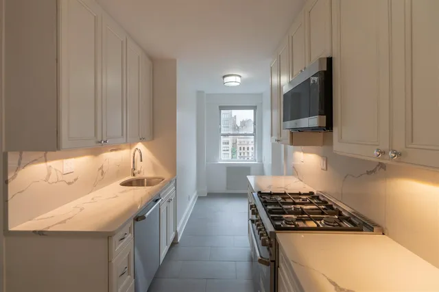 a view of a living room and a window