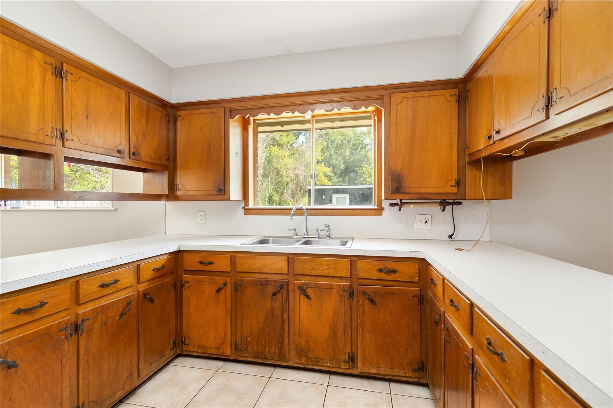 29518 West Hawthorne Drive Spring, TX 77386 - Photo 12 of 22 a kitchen with a sink and a window