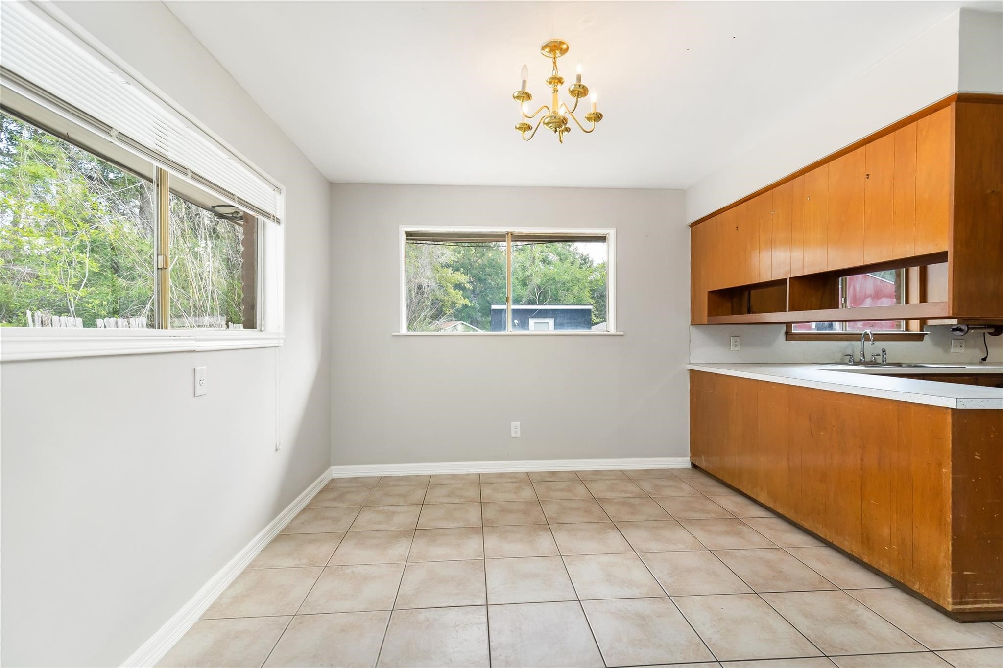 29518 West Hawthorne Drive Spring, TX 77386 - Photo 14 of 22 a view of a kitchen with an oven and wooden floor
