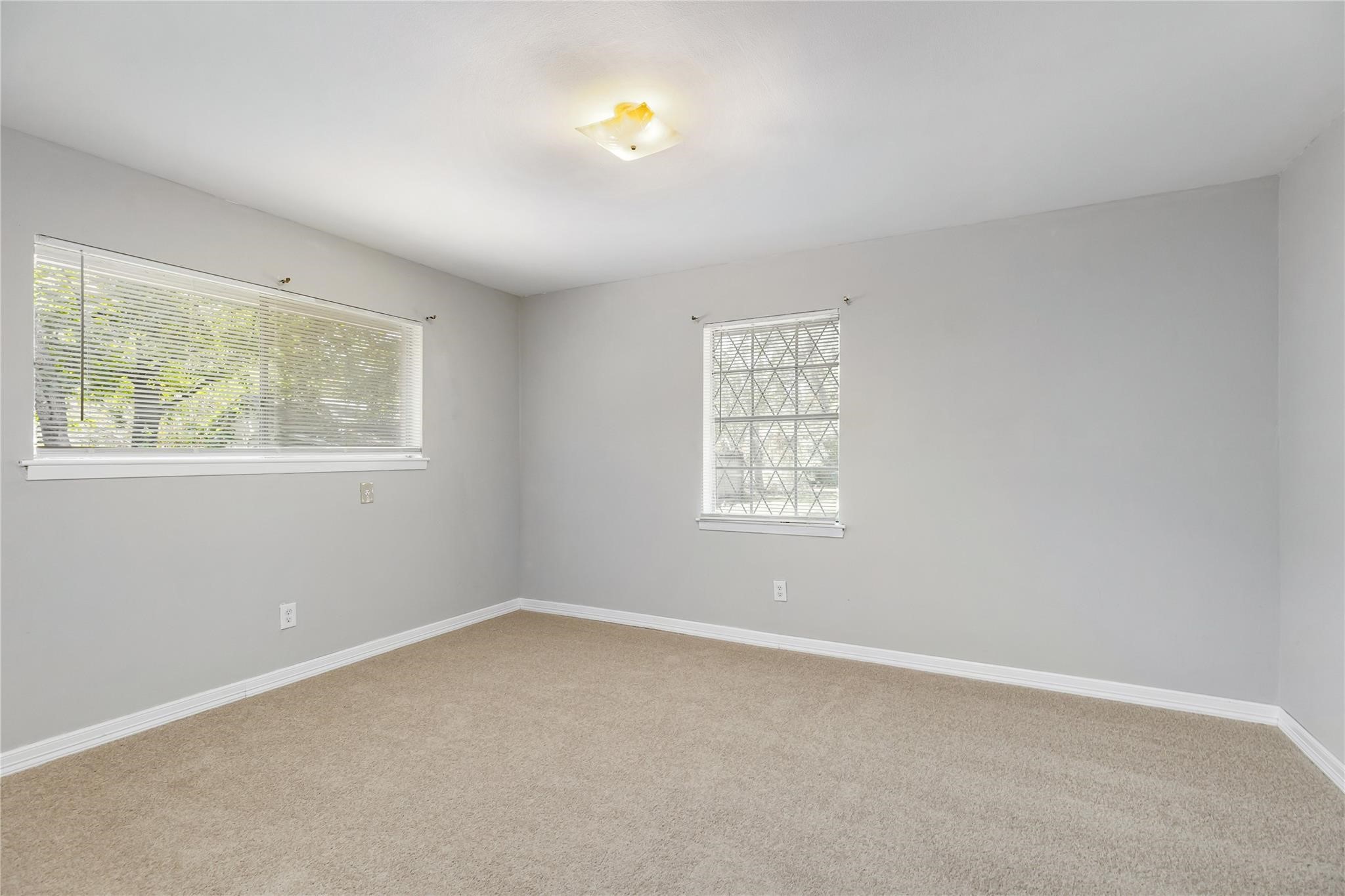 29518 West Hawthorne Drive Spring, TX 77386 - Photo 15 of 22 an empty room with windows