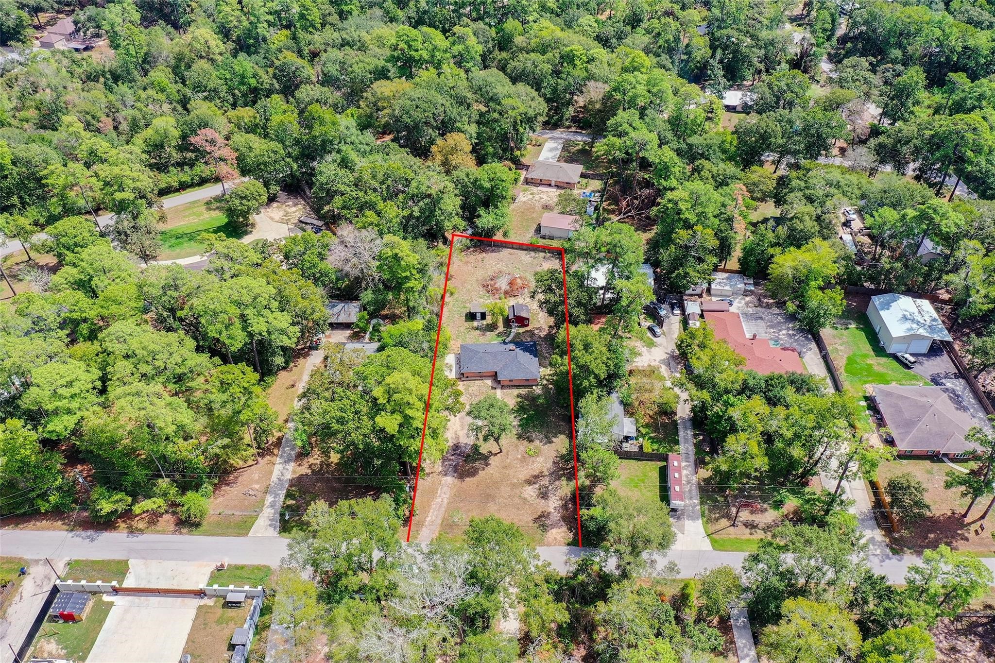 29518 West Hawthorne Drive Spring, TX 77386 - Photo 21 of 22 an aerial view of residential house with outdoor space and trees all around