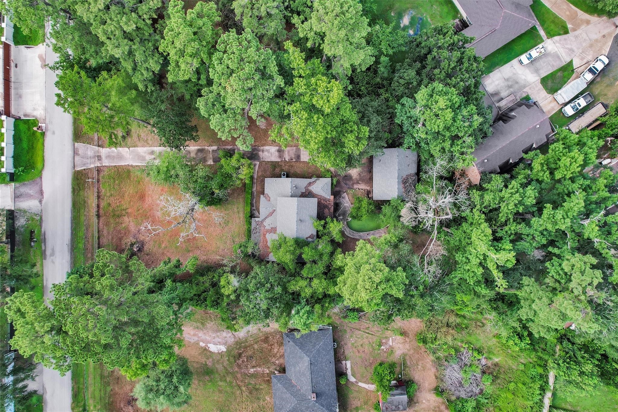 29518 West Hawthorne Drive Spring, TX 77386 - Photo 22 of 22 an aerial view of a house with a yard and garden