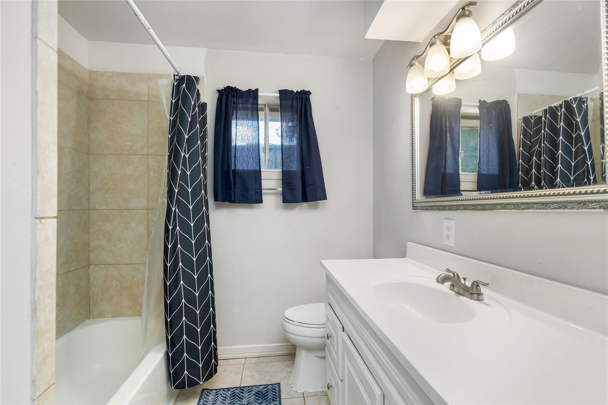29518 West Hawthorne Drive Spring, TX 77386 - Photo 5 of 22 a bathroom with a sink and a mirror