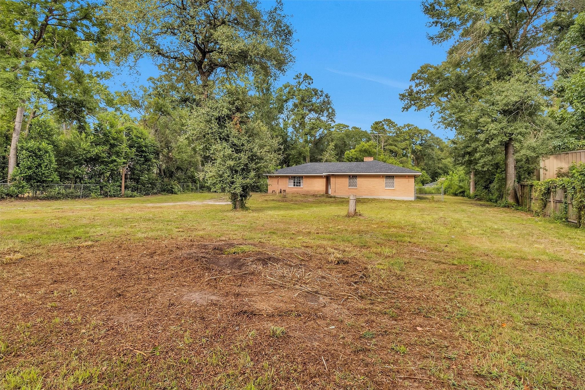 29518 West Hawthorne Drive Spring, TX 77386 - Photo 8 of 22 a swimming pool with an outdoor space and seating area