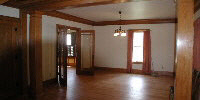 109 Adams Ridott, IL 61067 - Photo 3 of 4 a view of a hallway with wooden floor and stairs