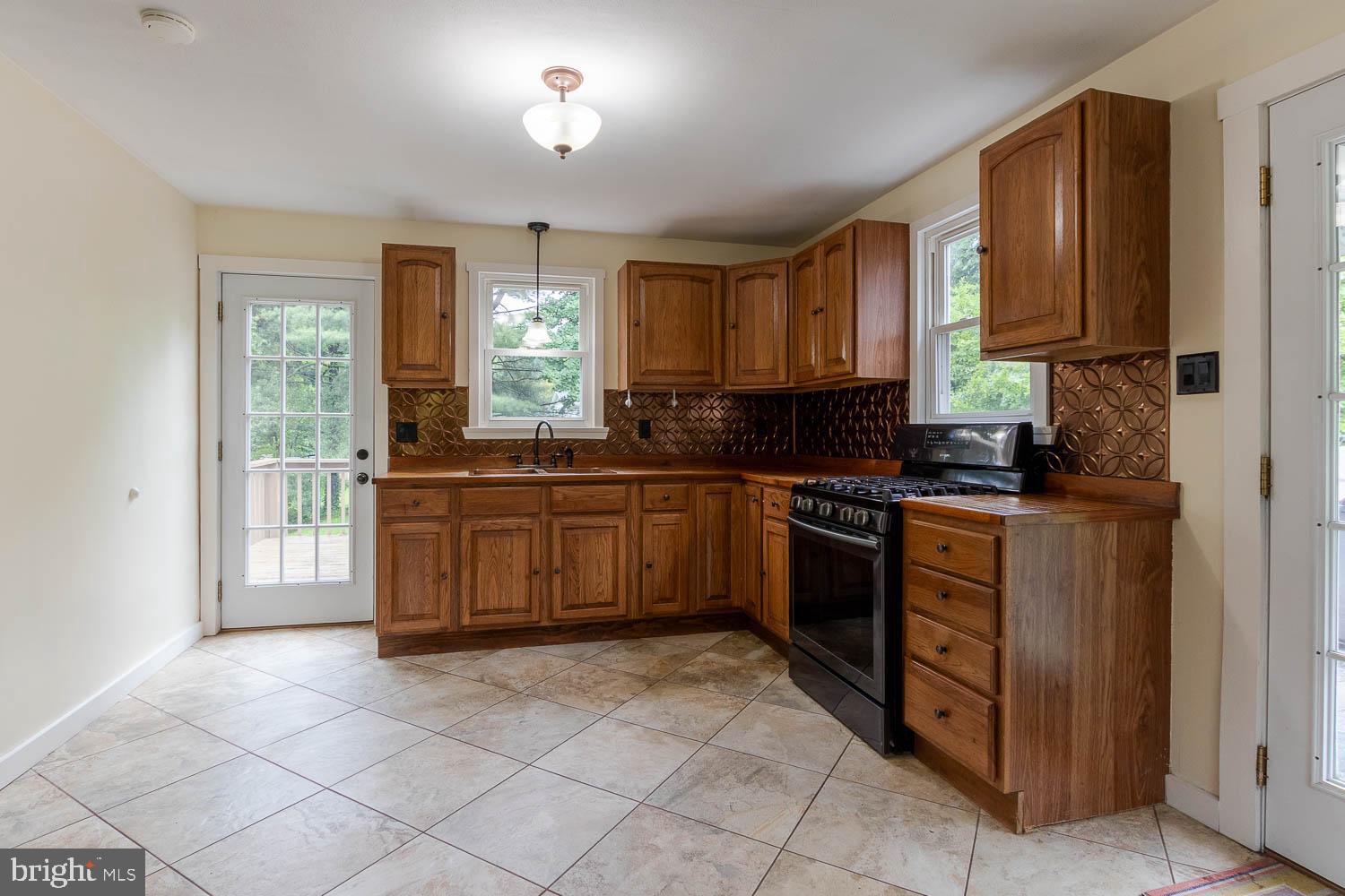 1724 East Branch Road State College, PA 16801 - Photo 6 of 31 Warm wood tones in a bright kitchen space.
