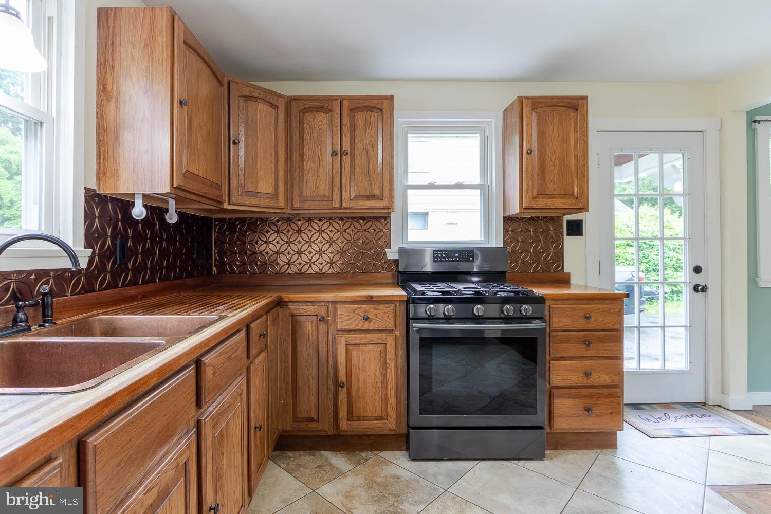 1724 East Branch Road State College, PA 16801 - Photo 8 of 31 Charming kitchen with rich wood cabinetry.