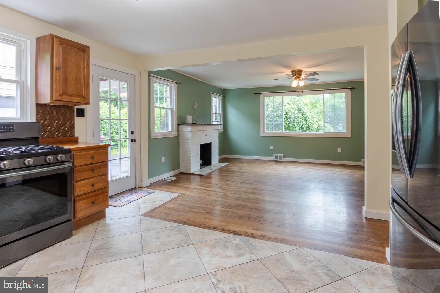 1724 East Branch Road State College, PA 16801 - Photo 9 of 31 Bright, inviting kitchen flows into living space.