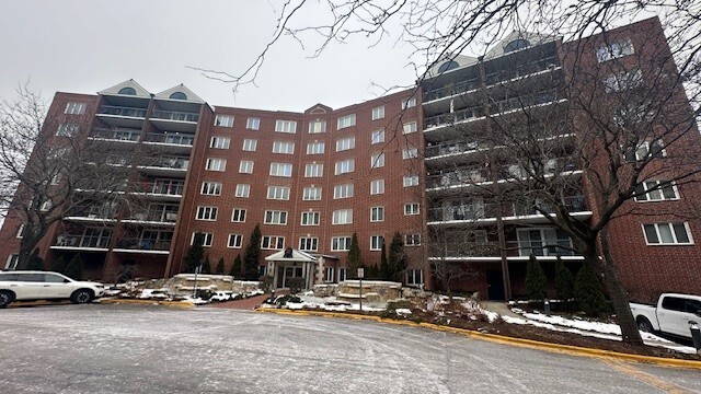 a front view of a building with street view