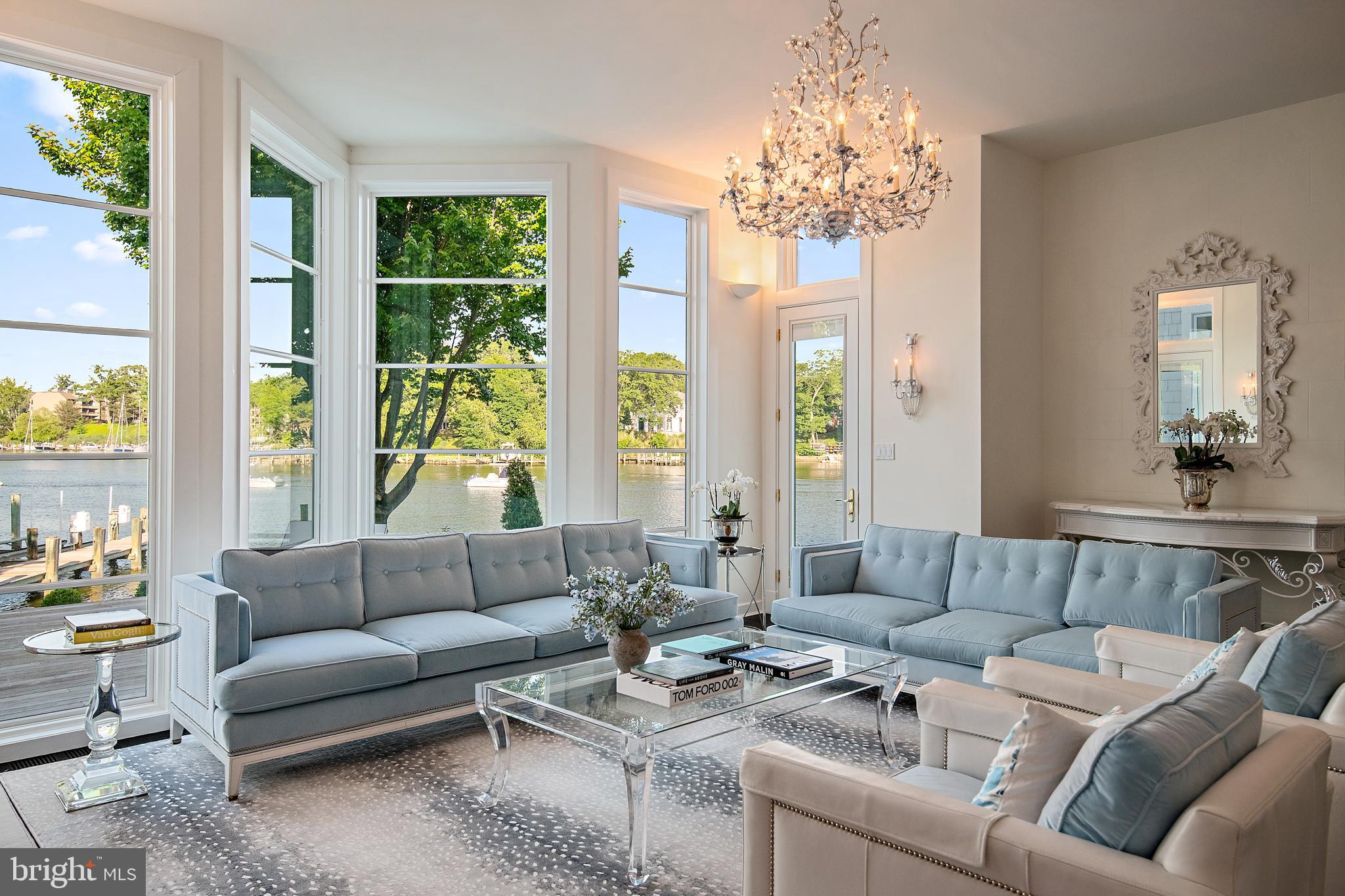 8 Spa View Circle Annapolis, MD 21401 - Photo 17 of 58 a living room with furniture and a chandelier