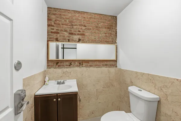 a bathroom with a sink and a toilet