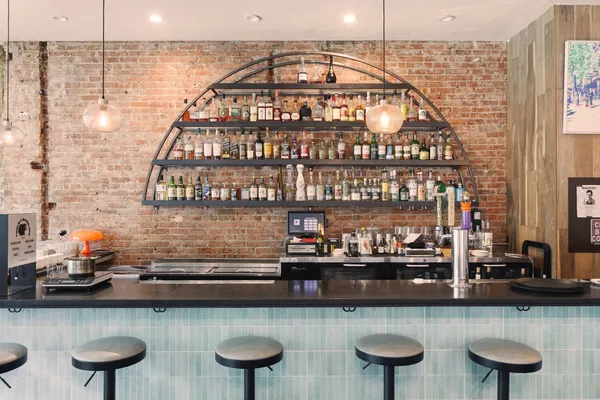 a kitchen with a sink and a stove