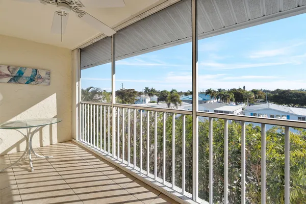 a view of a balcony with lake view
