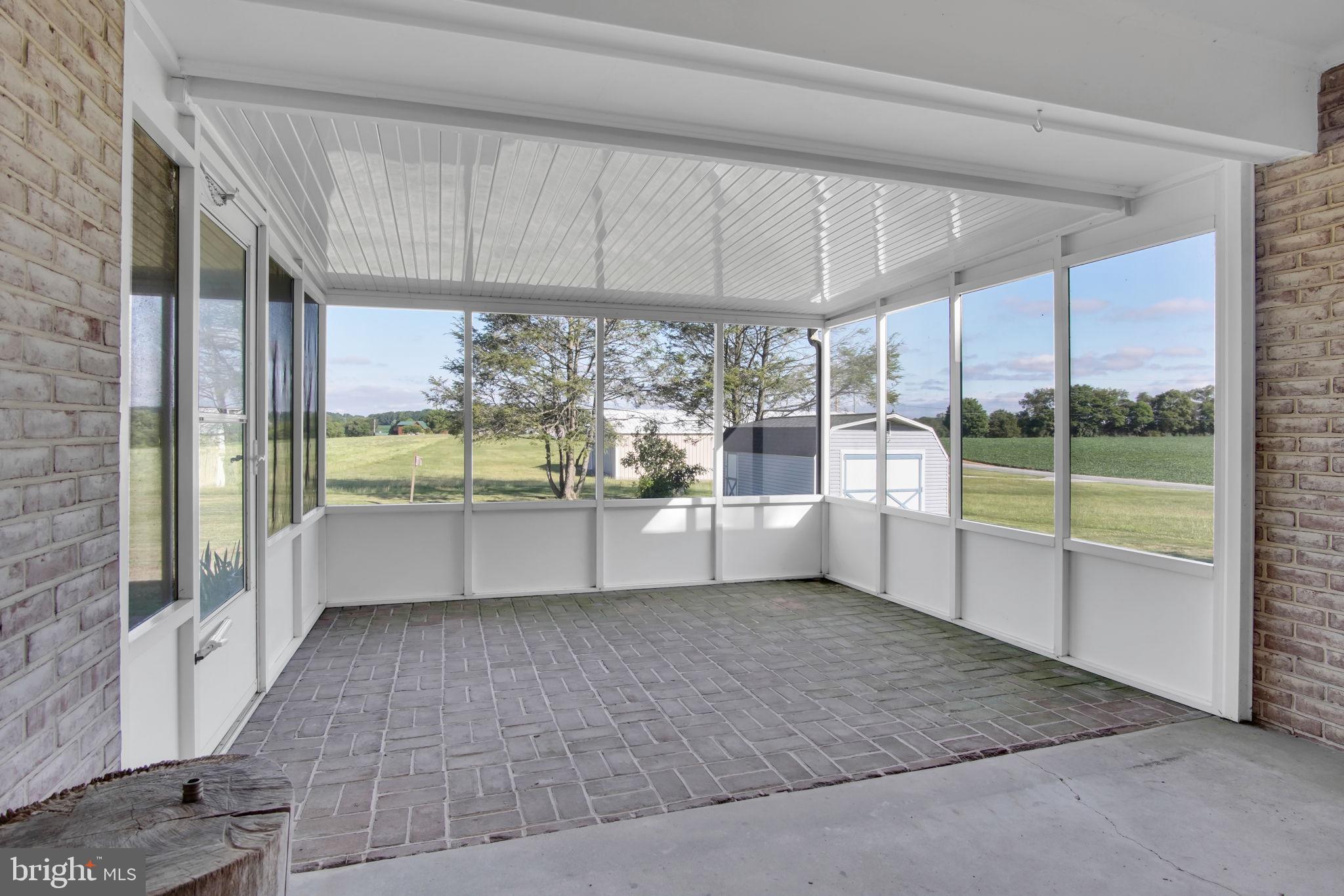 2382 Stoverstown Road Spring Grove, PA 17362 - Photo 11 of 33 Serene sunroom with scenic views.