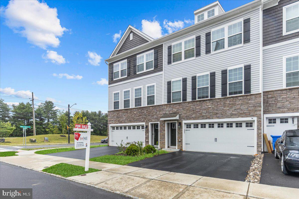 a front view of a building with street view