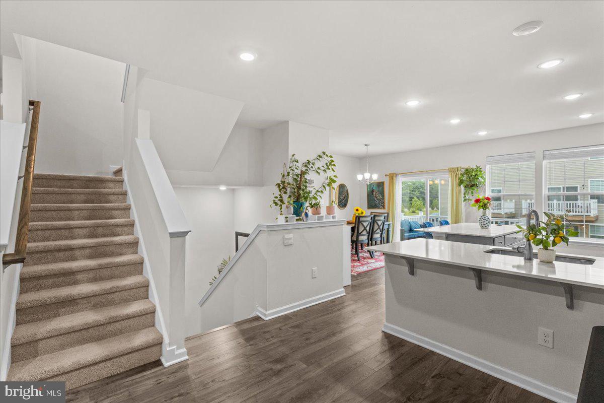 9 Sister's Farmstead Road Mount Laurel, NJ 08054 - Photo 14 of 43 a room with lots of white furniture wooden floor and entryway