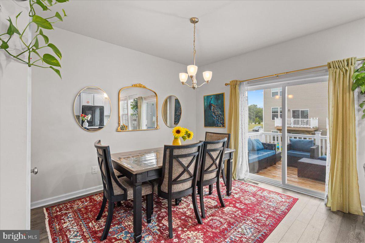 9 Sister's Farmstead Road Mount Laurel, NJ 08054 - Photo 15 of 43 a view of a dining room with furniture and chandelier