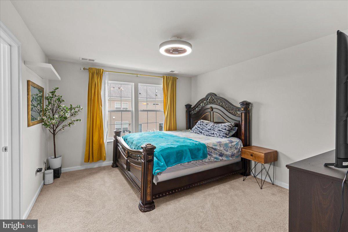 9 Sister's Farmstead Road Mount Laurel, NJ 08054 - Photo 26 of 43 a bedroom with a bed and a window