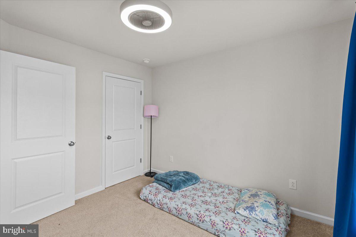 9 Sister's Farmstead Road Mount Laurel, NJ 08054 - Photo 34 of 43 a bedroom with a bed and a rug