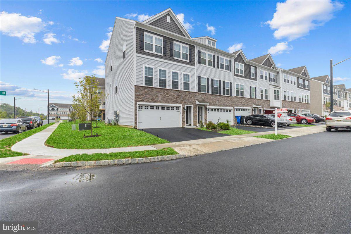 9 Sister's Farmstead Road Mount Laurel, NJ 08054 - Photo 4 of 43 a view of a street with a building in the background