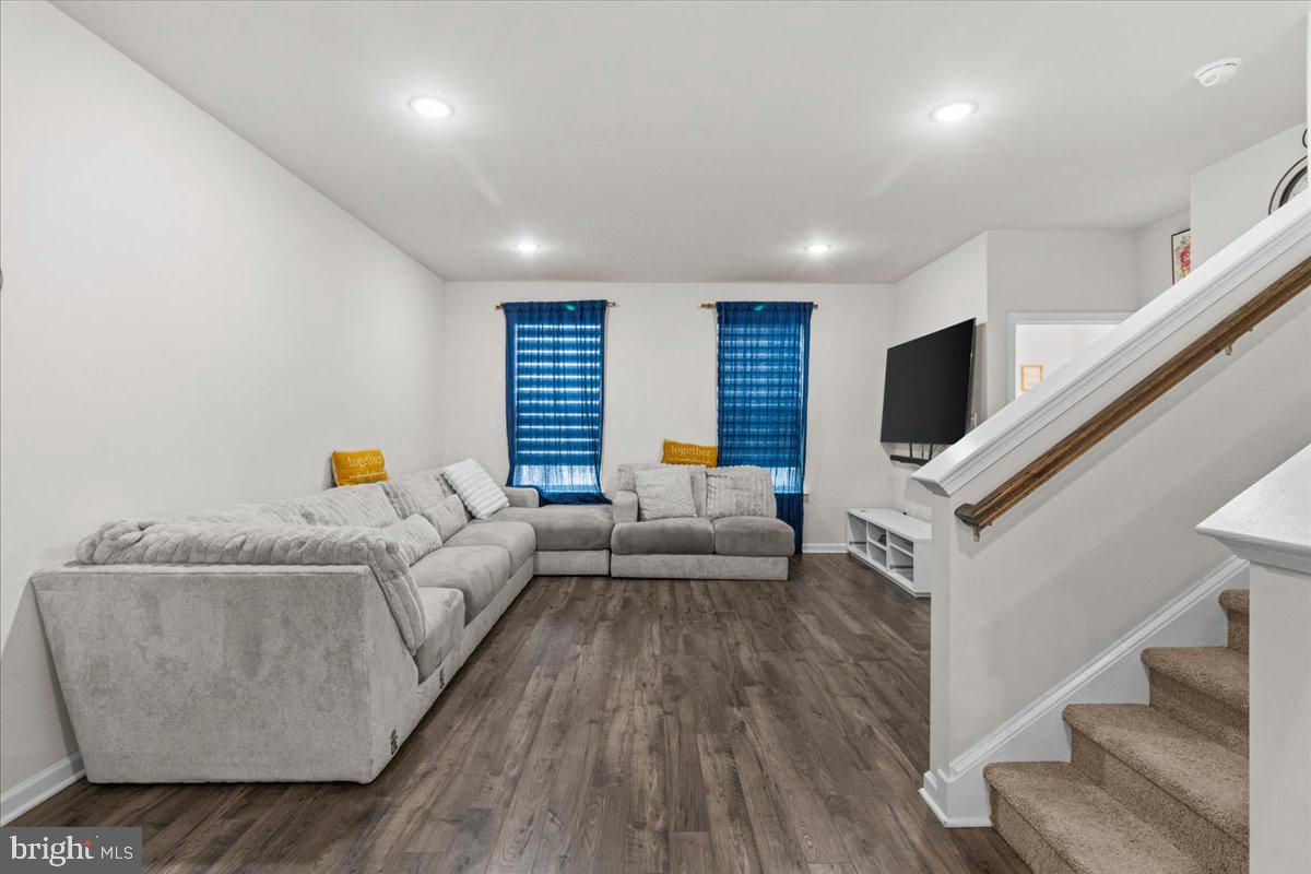 9 Sister's Farmstead Road Mount Laurel, NJ 08054 - Photo 6 of 43 a living room with furniture and a flat screen tv