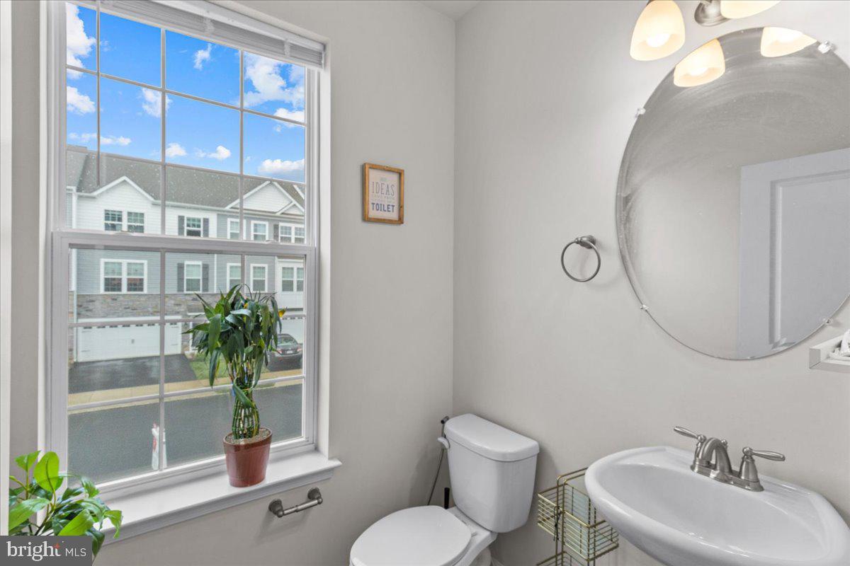 9 Sister's Farmstead Road Mount Laurel, NJ 08054 - Photo 9 of 43 a bathroom with a toilet a sink and mirror