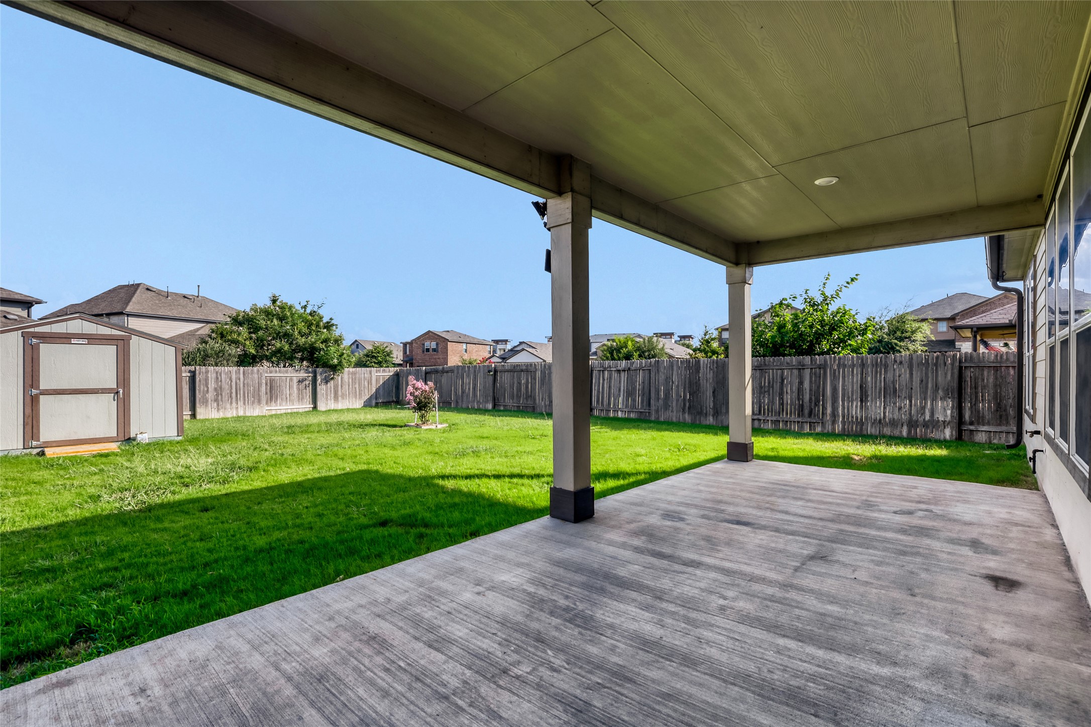 104 Kavanaugh Street Georgetown, TX 78628 - Photo 2 of 30 Large back patio - level yard and large shed conveys