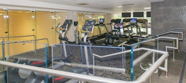 a view of a room with gym equipment